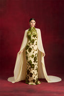 Le Thanh Hoa velvet flora chiffon gown featuring elegant floral design and flowing fabric for formal occasions.