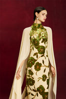 Le Thanh Hoa velvet flora chiffon gown featuring intricate floral embroidery and flowing fabric, elegant evening wear.