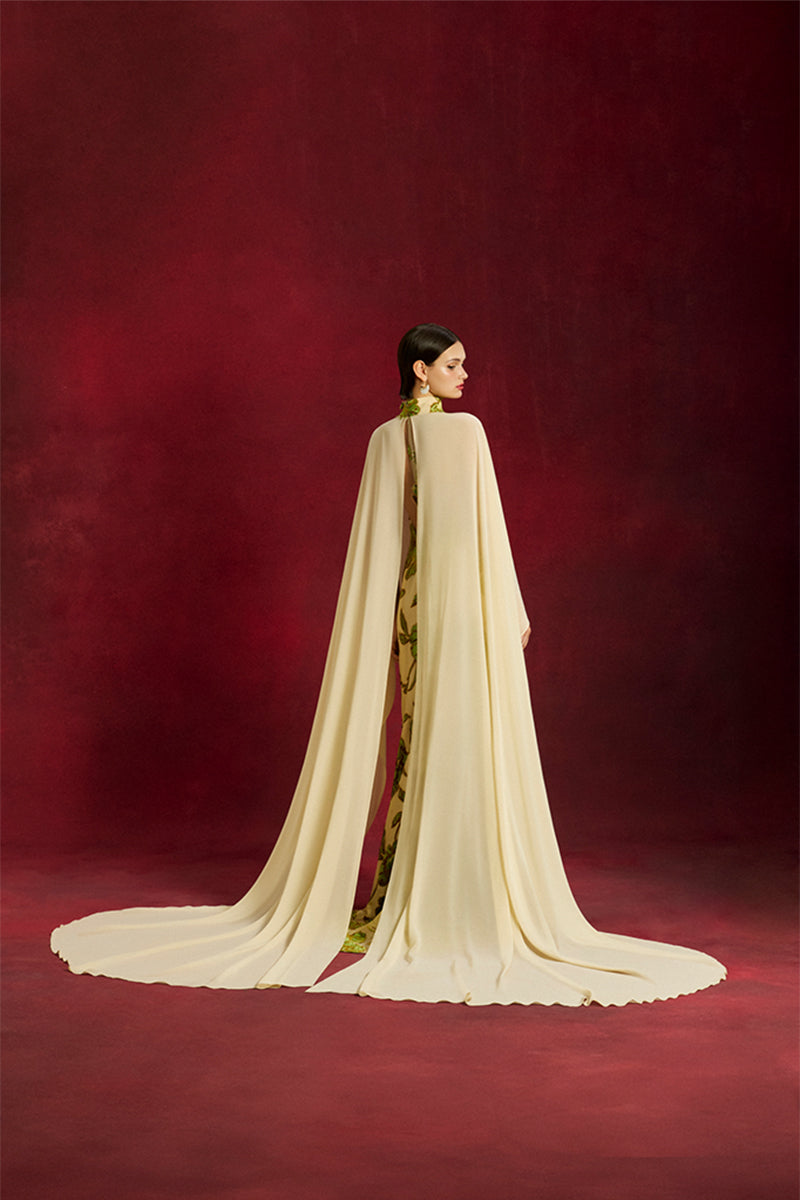 Le Thanh Hoa velvet floral chiffon gown with elegant design, featuring soft fabric and intricate floral patterns.