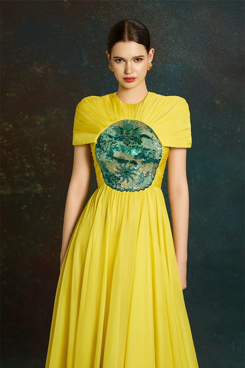 Elegant dragon sun-gown by Le Thanh Hoa featuring intricate embroidery and flowing fabric, perfect for special occasions.