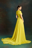 Le Thanh Hoa dragon sun-gown with vibrant embroidered design, flowing fabric, and traditional style for special occasions.