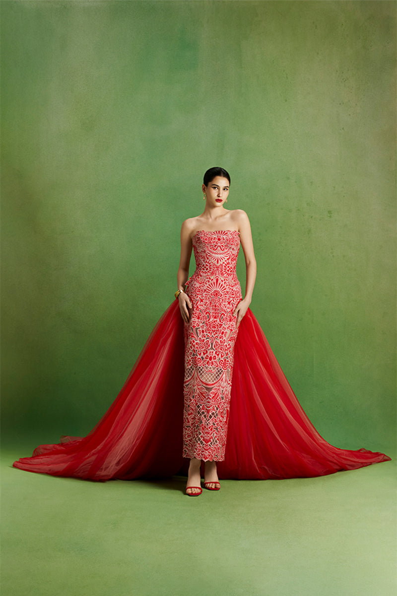 Le Thanh Hoa Imperial Peony gown featuring intricate floral embroidery and elegant flowing fabric, perfect for formal occasions.
