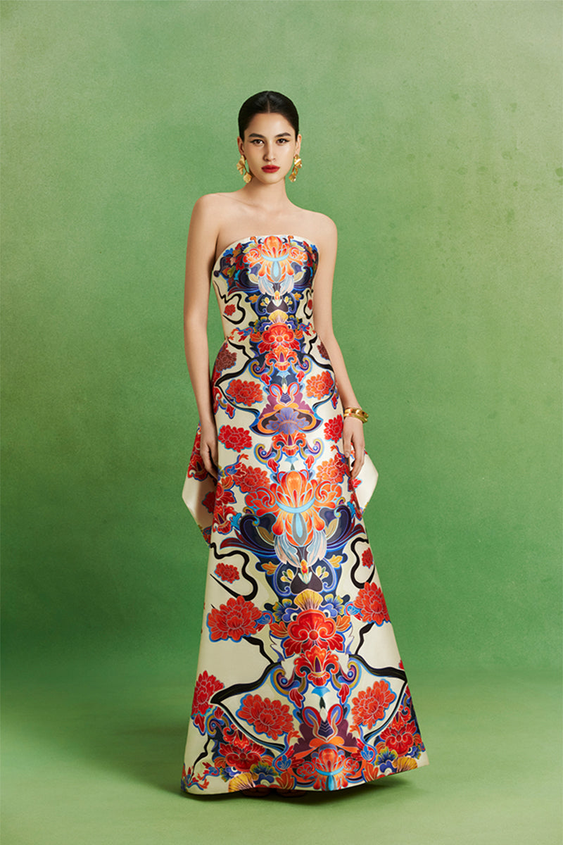 Le Thanh Hoa mosaic gown set featuring intricate mosaic patterns, elegant design, and flowing fabric for formal occasions.