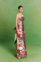 Le Thanh Hoa Mosaic gown featuring intricate mosaic patterns, elegant long gown with detailed embroidery and flowing fabric.
