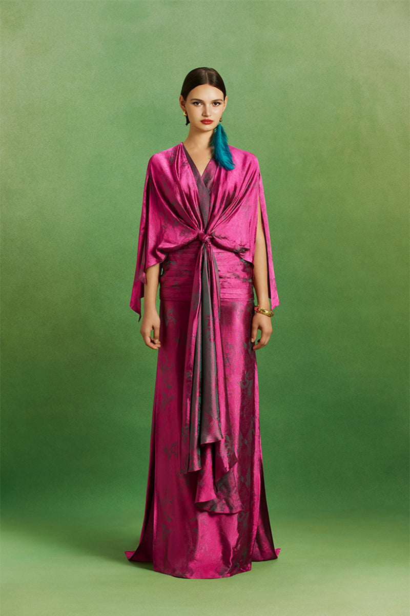 Le Thanh Hoa Ma Chau Heritage Dress, elegant maxi dress with traditional embroidery, displayed on a neutral background