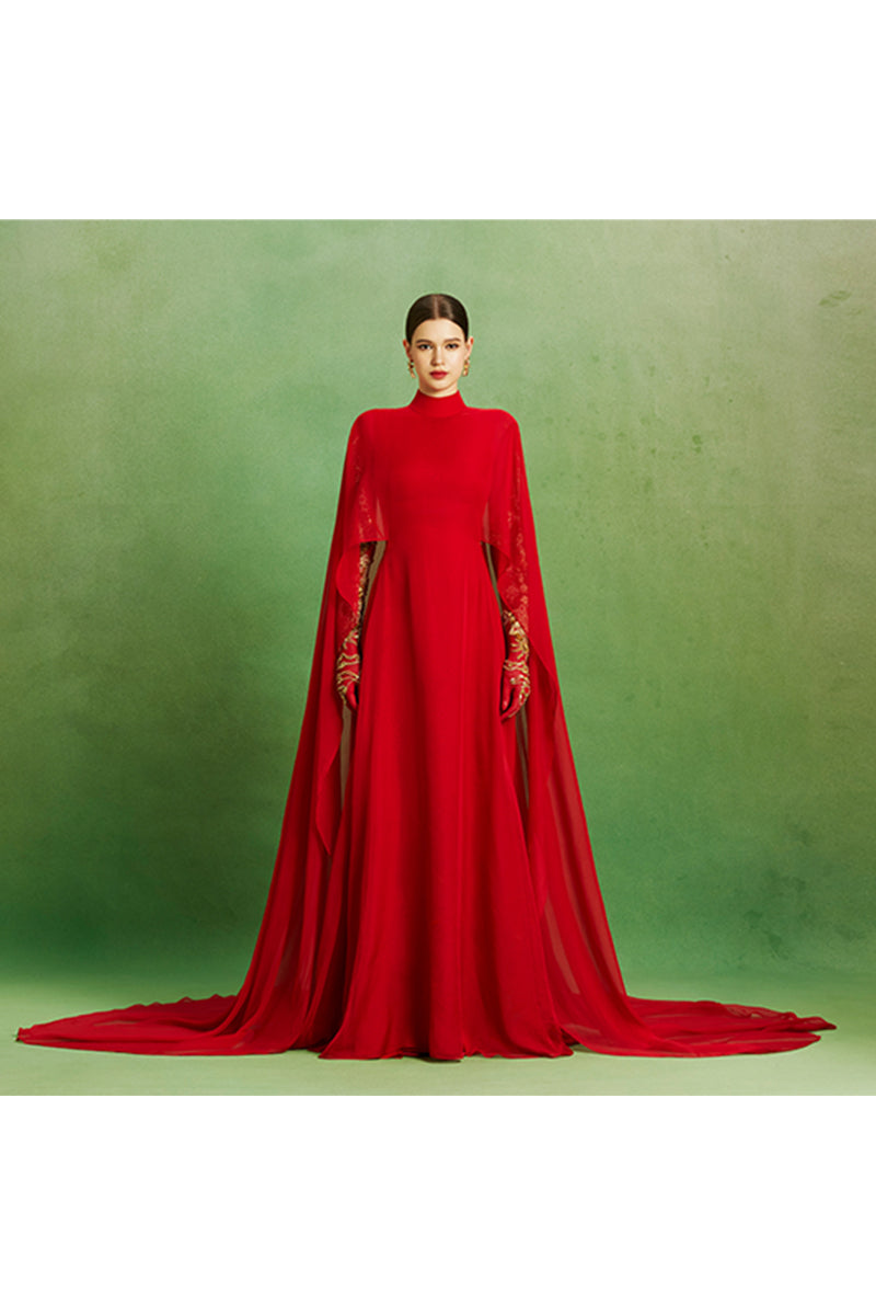 Elegant Scarlet Majesty gown by Le Thanh Hoa featuring intricate embroidery and flowing fabric, perfect for formal occasions.