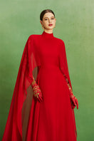 Elegant Scarlet Majesty gown by Le Thanh Hoa featuring flowing fabric and intricate design, perfect for formal occasions.