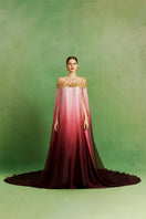 Elegant Dusk Rose Ombre gown by Le Thanh Hoa featuring flowing fabric and a graceful silhouette.