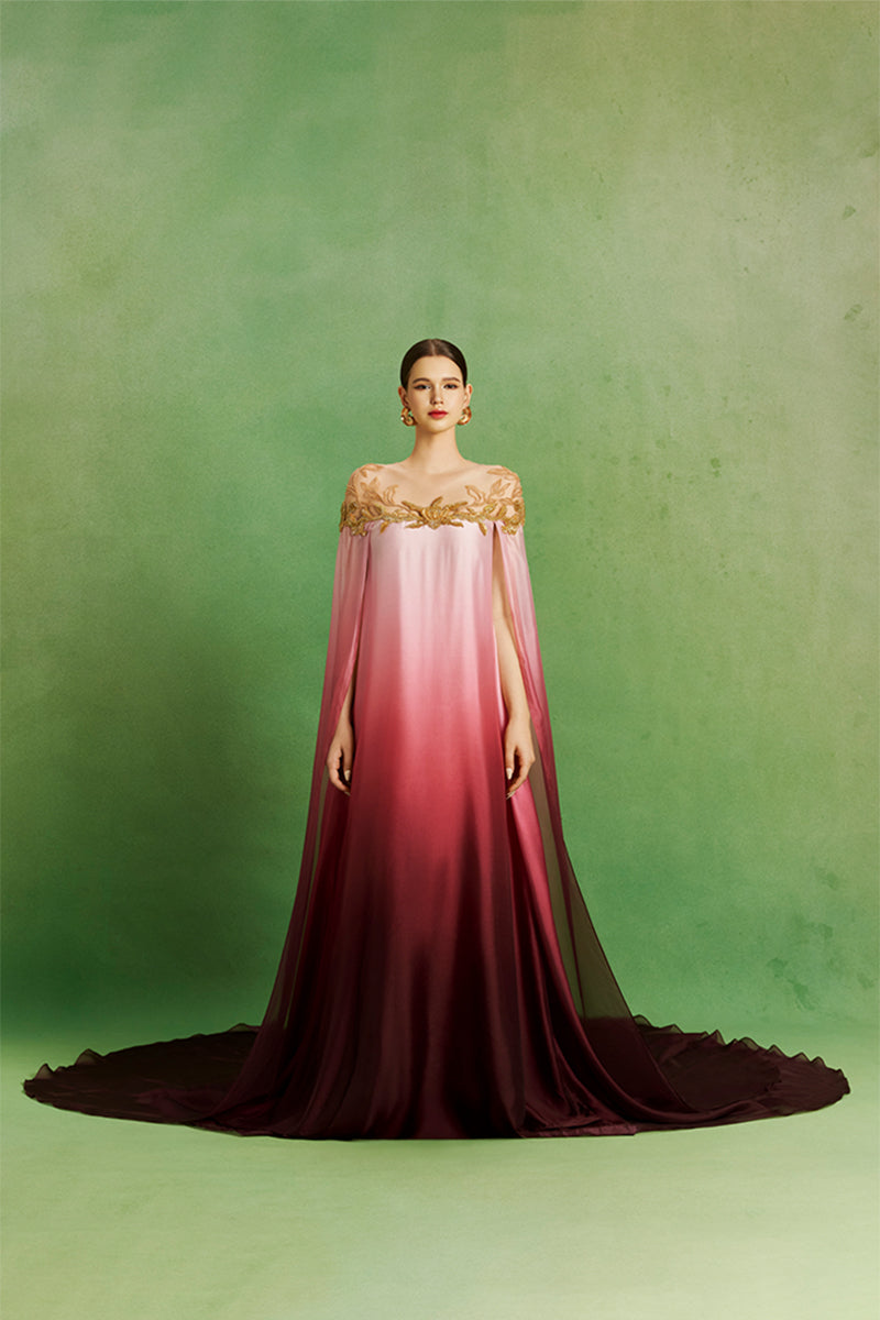 Elegant Dusk Rose Ombre gown by Le Thanh Hoa featuring flowing fabric and a graceful silhouette.