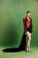 Le Thanh Hoa Imperial Edge Set of mini dresses, stylish and modern, shown in a layered design with vibrant colors.