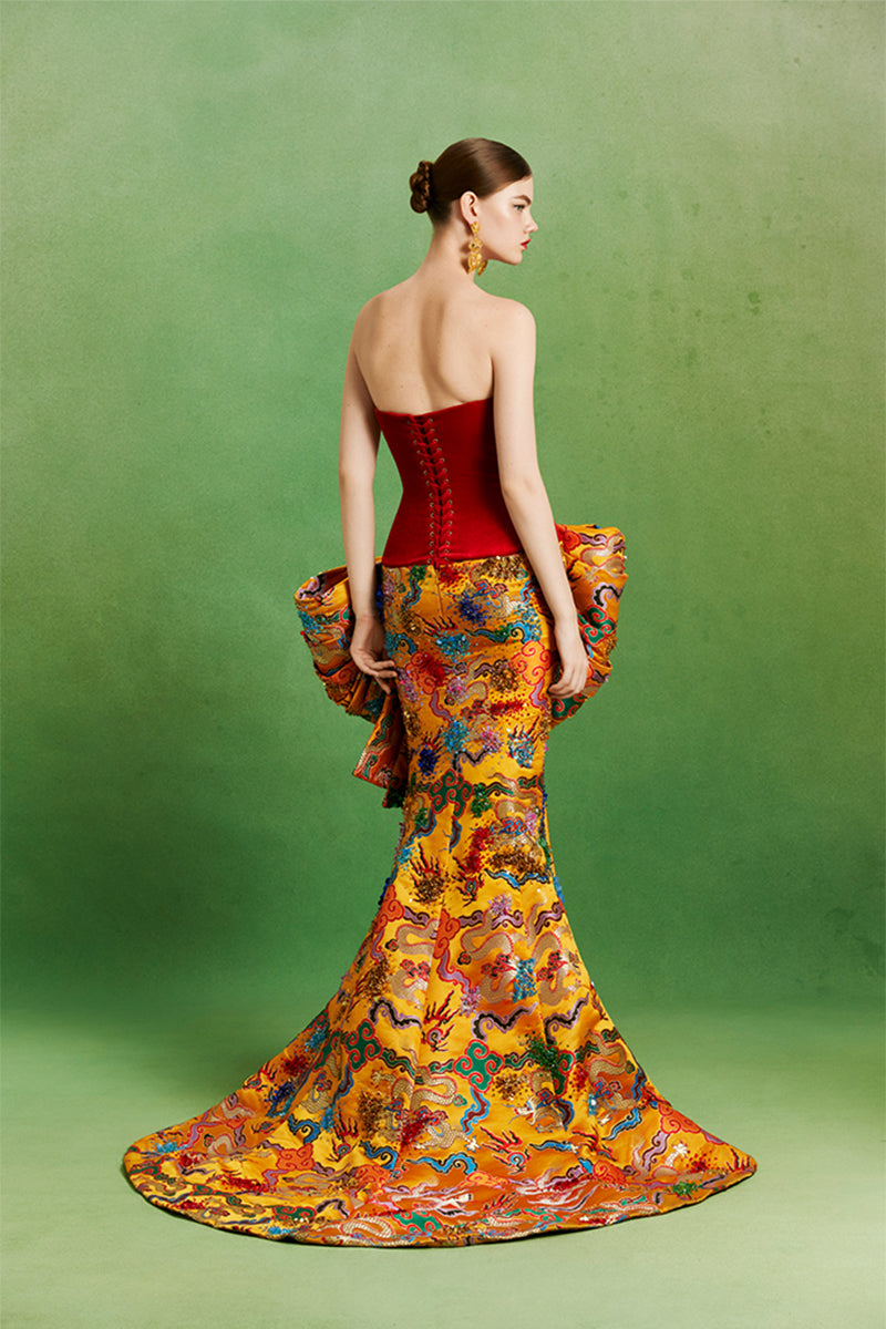 Elegant Imperial Bow Gown by Le Thanh Hoa featuring intricate design and flowing fabric, perfect for formal occasions.