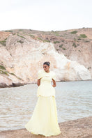 Matters Verona butter yellow gown, elegant dress with flowing fabric and classic design, suitable for formal occasions.