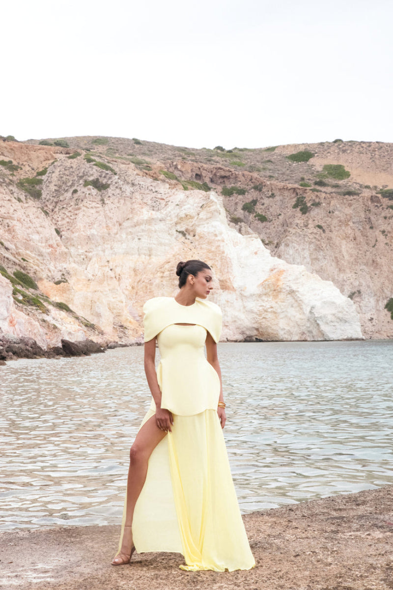 Matters Verona butter yellow gown showing elegant, flowing fabric and stylish design perfect for formal occasions.