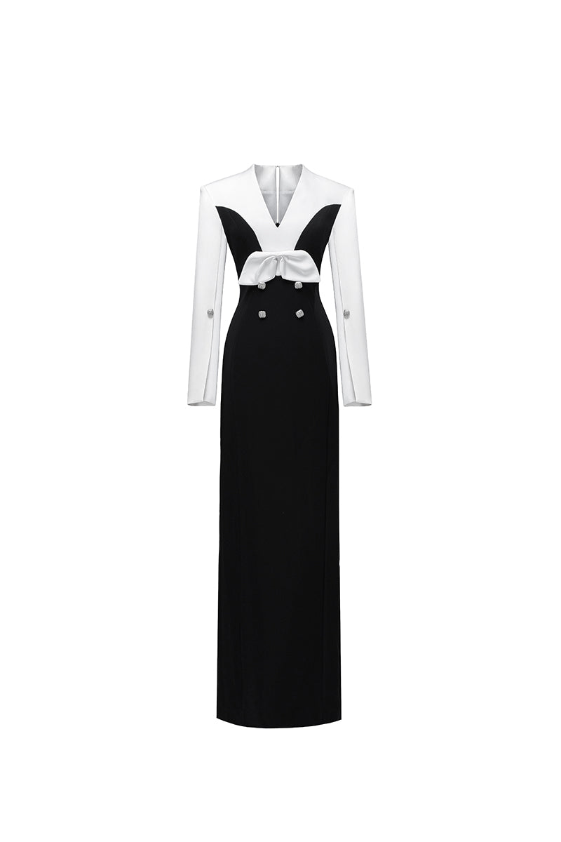 Elegant white and black Shalom gown by Jenny K Tran, showcasing a flowing design with intricate detailing and a sophisticated silhouette.