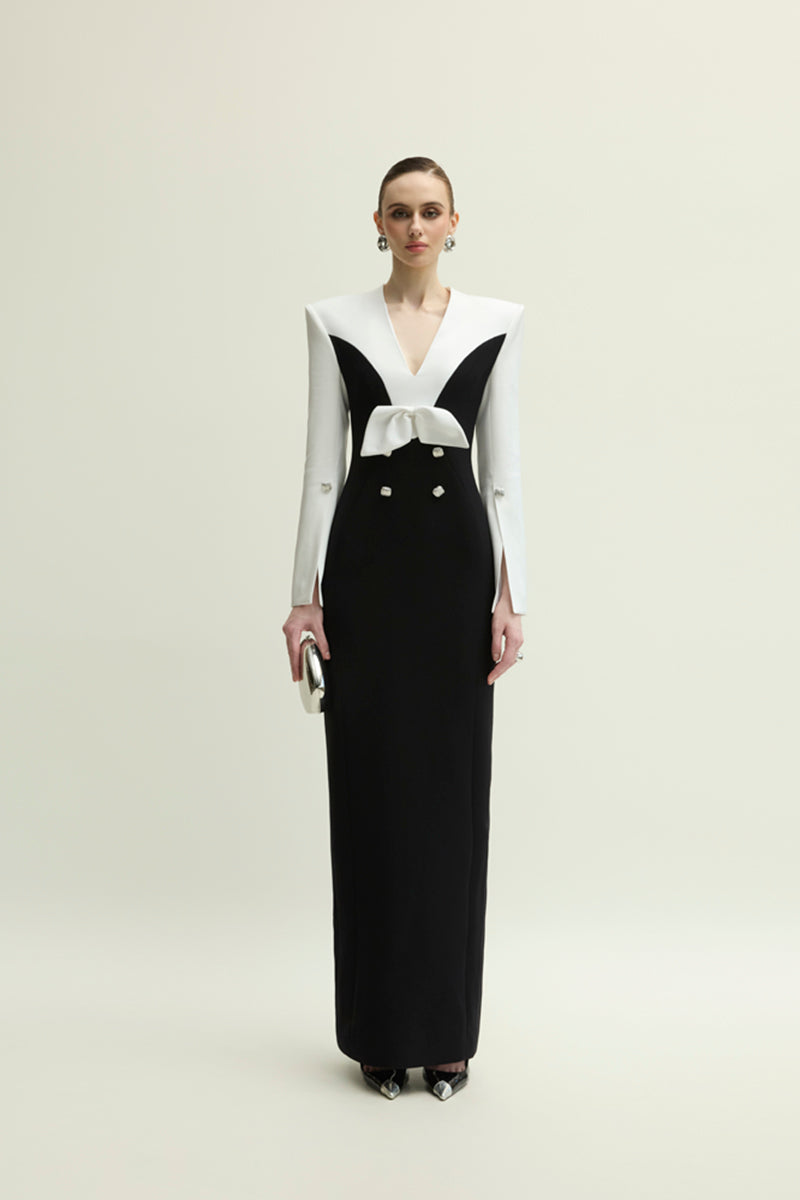 Jenny K Tran Shalom gown in white and black, elegant dress with a flowing design, displayed on a model.