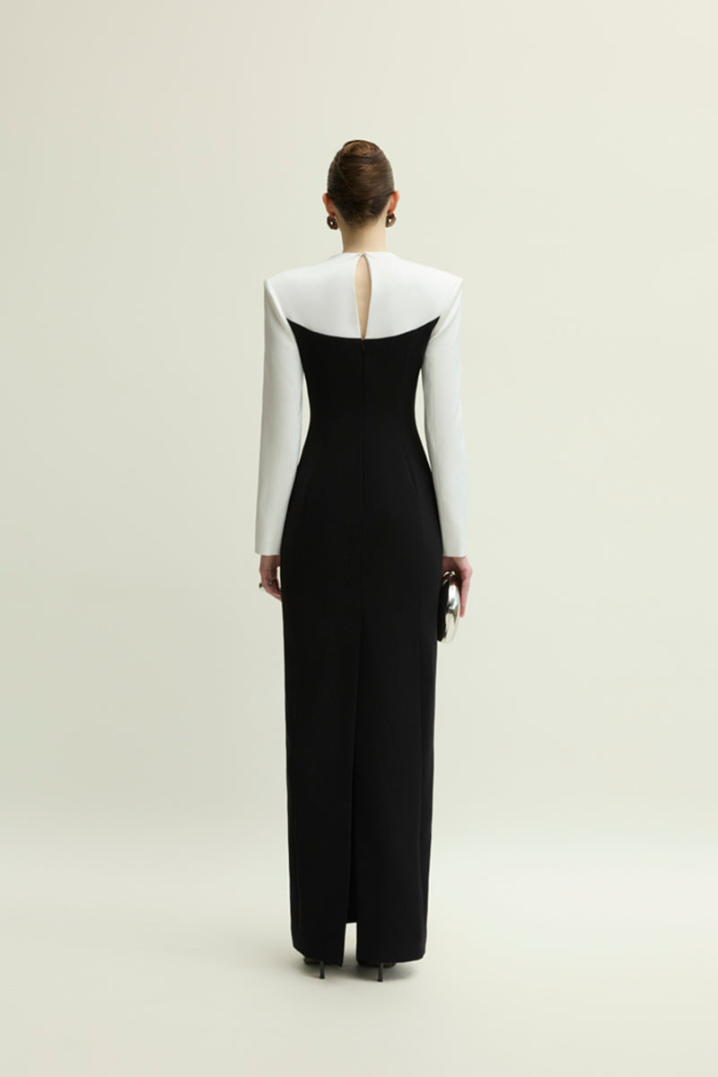 Jenny K Tran Shalom gown in white and black, elegant dress with flowing fabric and stylish design, perfect for formal occasions.
