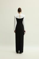 Jenny K Tran Shalom gown in white and black, elegant dress with flowing fabric and stylish design, perfect for formal occasions.