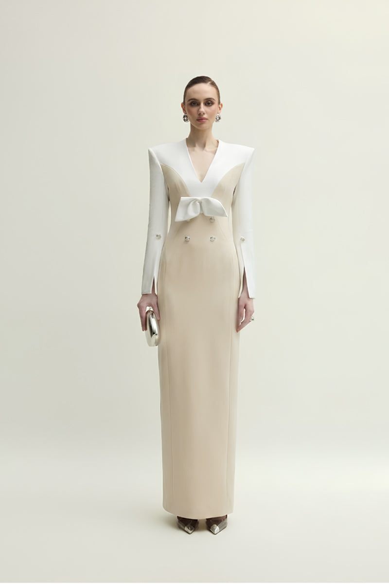 Elegant white and beige Shalom gown by Jenny K Tran, showcasing flowing fabric and intricate design details.