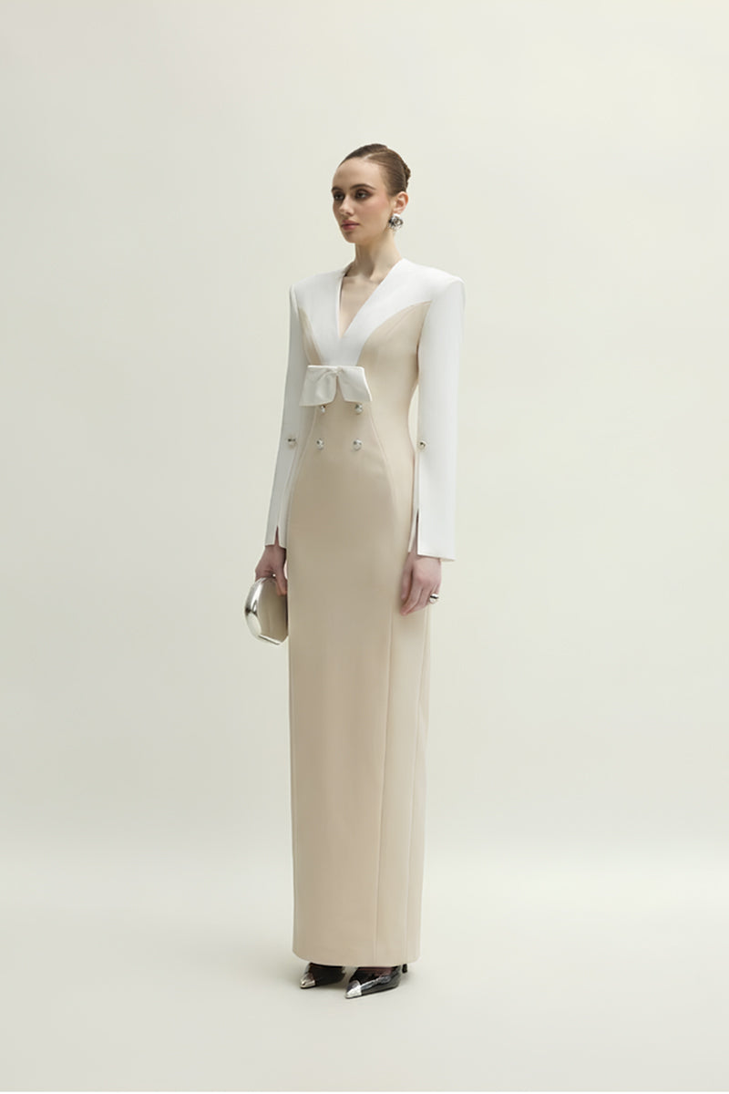 Jenny K Tran Shalom dress in white and beige, elegant gown with flowing fabric and intricate details, perfect for formal occasions.