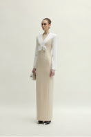 Jenny K Tran Shalom dress in white and beige, elegant gown with flowing fabric and intricate details, perfect for formal occasions.