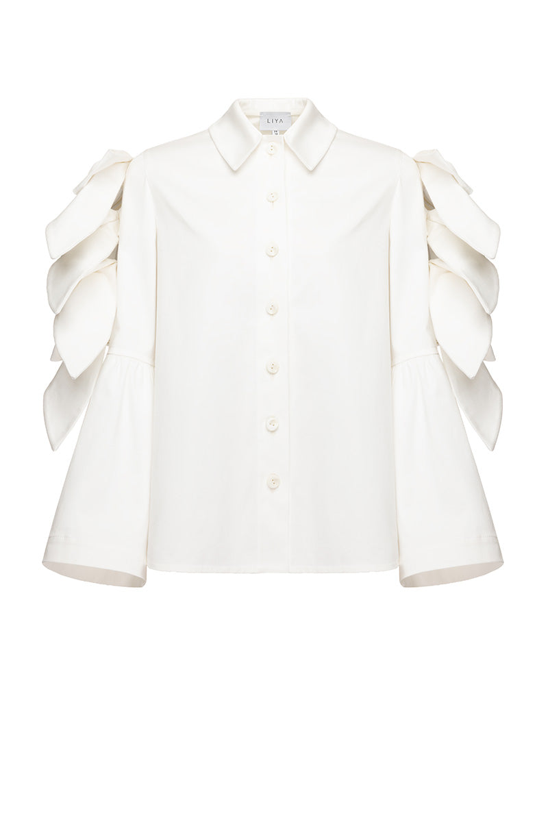 Liya white shirt with bow sleeves, casual long-sleeve shirt for women, featuring a stylish bow detail on the sleeves.