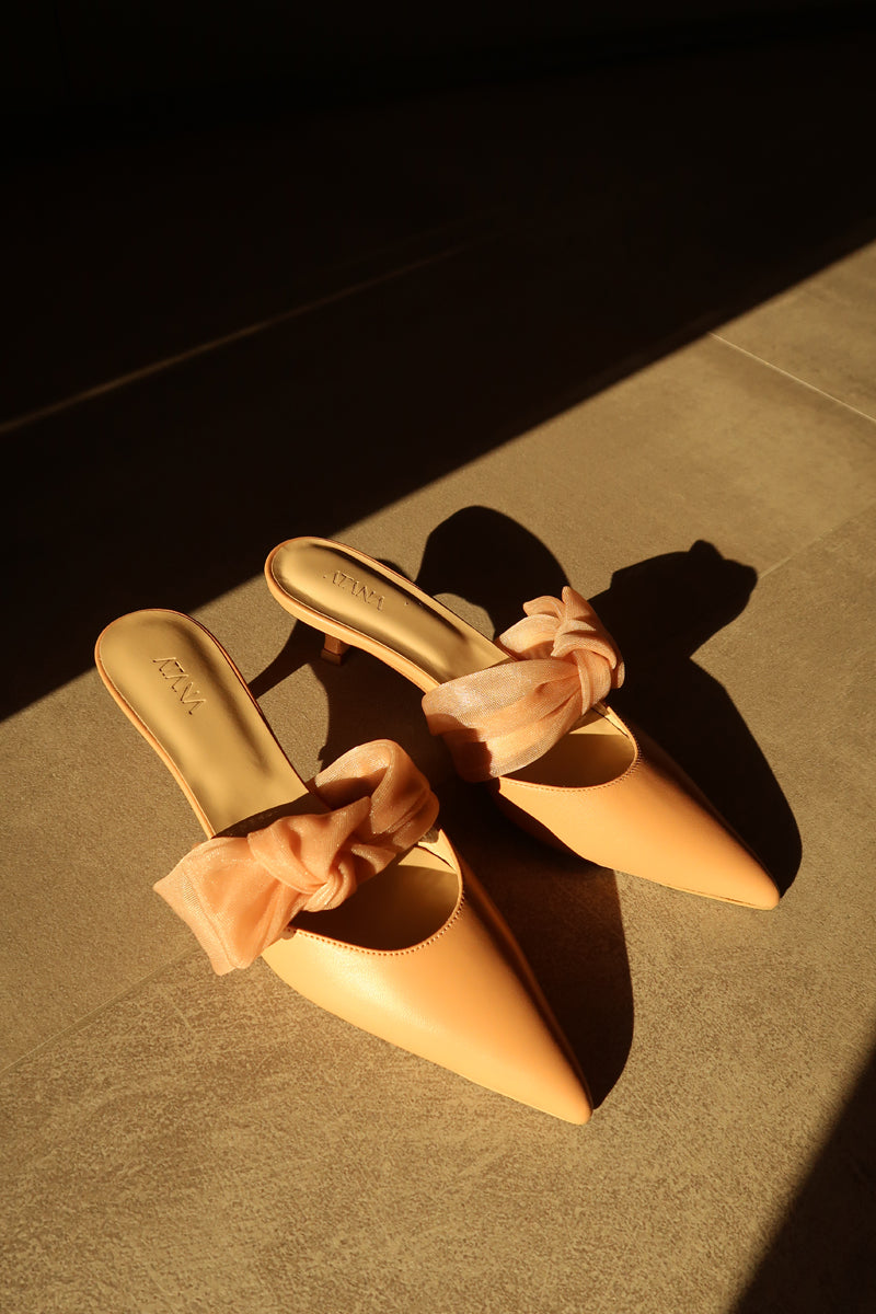 Tan nappa and mesh side tie mule heels by House of Atana, featuring a stylish open back and elegant design.