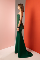 Joanna Andraos emerald corset top and skirt co-ords set shown from the side, featuring a fitted green corset and matching skirt.