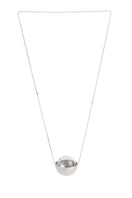 Silver and glass half-sphere necklace by MAZ Manuela Álvarez featuring a sleek silver chain and a glossy glass pendant.