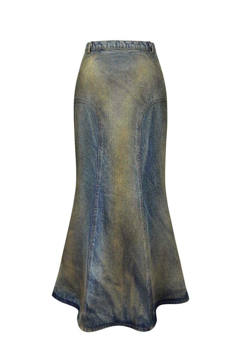 Back view of NADYA DZYAK Rusty Denim midi skirt with a fitted waist and A-line silhouette, showcasing denim fabric and stitching details.