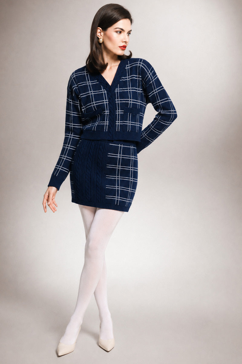 Navy checked knit mini skirt by Liya featuring a fitted waist and short hem, perfect for casual or stylish outfits.
