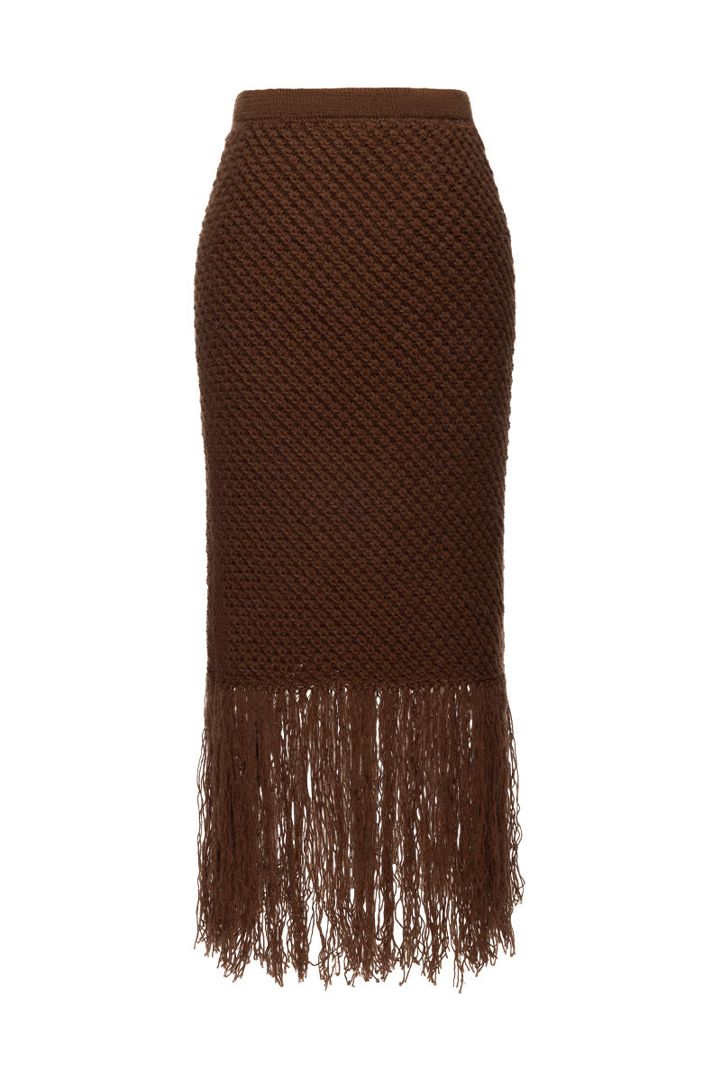 Liya brown maxi skirt with fringes, flowing fabric and boho style, shown on a hanger.