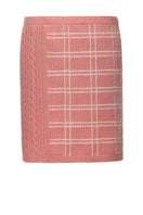 Soft pink checked knit mini skirt by Liya, featuring a cozy, stylish design with a fitted waistband and classic check pattern.