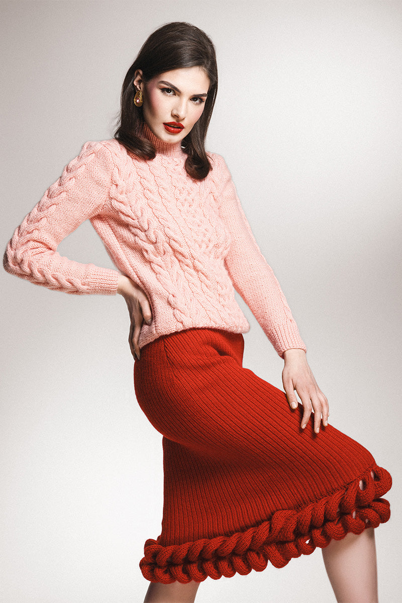 Liya red braided midi skirt featuring a stylish braided design, high waist, and flowing length, perfect for casual or dressy outfits.