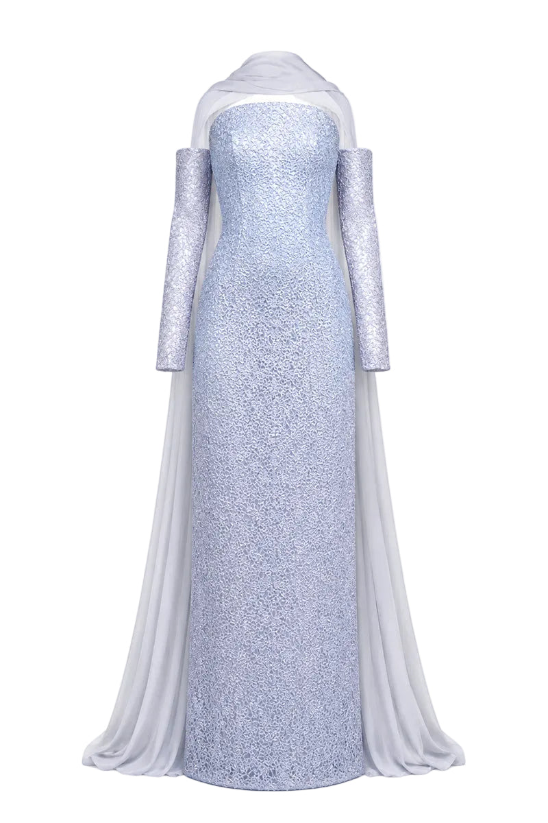 Baby blue to silver ombré embroidered gown by Joanna Andraos, featuring delicate embroidery and elegant flowing fabric.