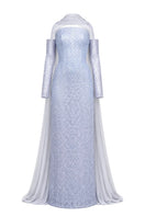 Baby blue to silver ombré embroidered gown by Joanna Andraos, featuring delicate embroidery and elegant flowing fabric.