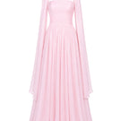 Elegant blush evening gown by Joanna Andraos, flowing fabric with intricate detailing, perfect for formal occasions.