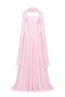 Elegant blush evening gown by Joanna Andraos, flowing fabric with intricate detailing, perfect for formal occasions.