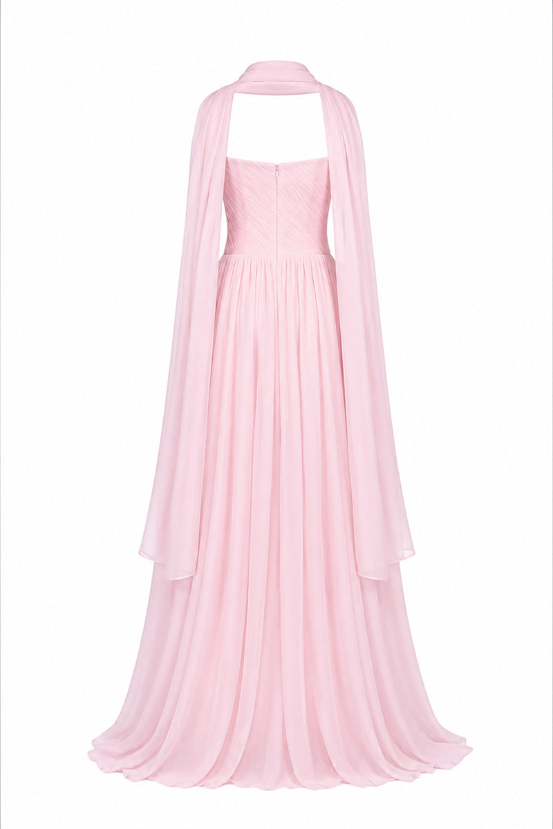 Elegant blush evening gown by Joanna Andraos featuring flowing fabric and intricate detailing, perfect for formal occasions.
