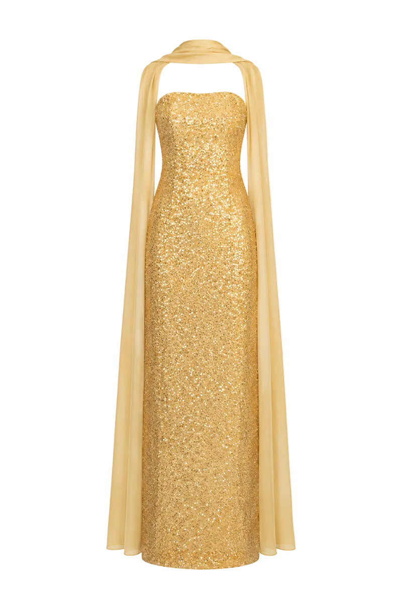 Gold embroidered gown by Joanna Andraos featuring intricate embroidery and luxurious fabric, displayed on a mannequin.
