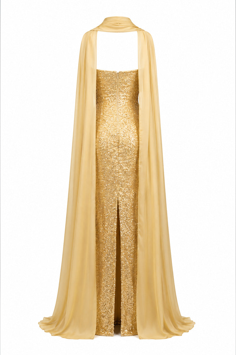 Gold embroidered gown by Joanna Andraos featuring intricate embroidery and elegant fabric, perfect for formal occasions.