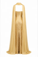 Gold embroidered gown by Joanna Andraos featuring intricate embroidery and elegant design, perfect for formal occasions.