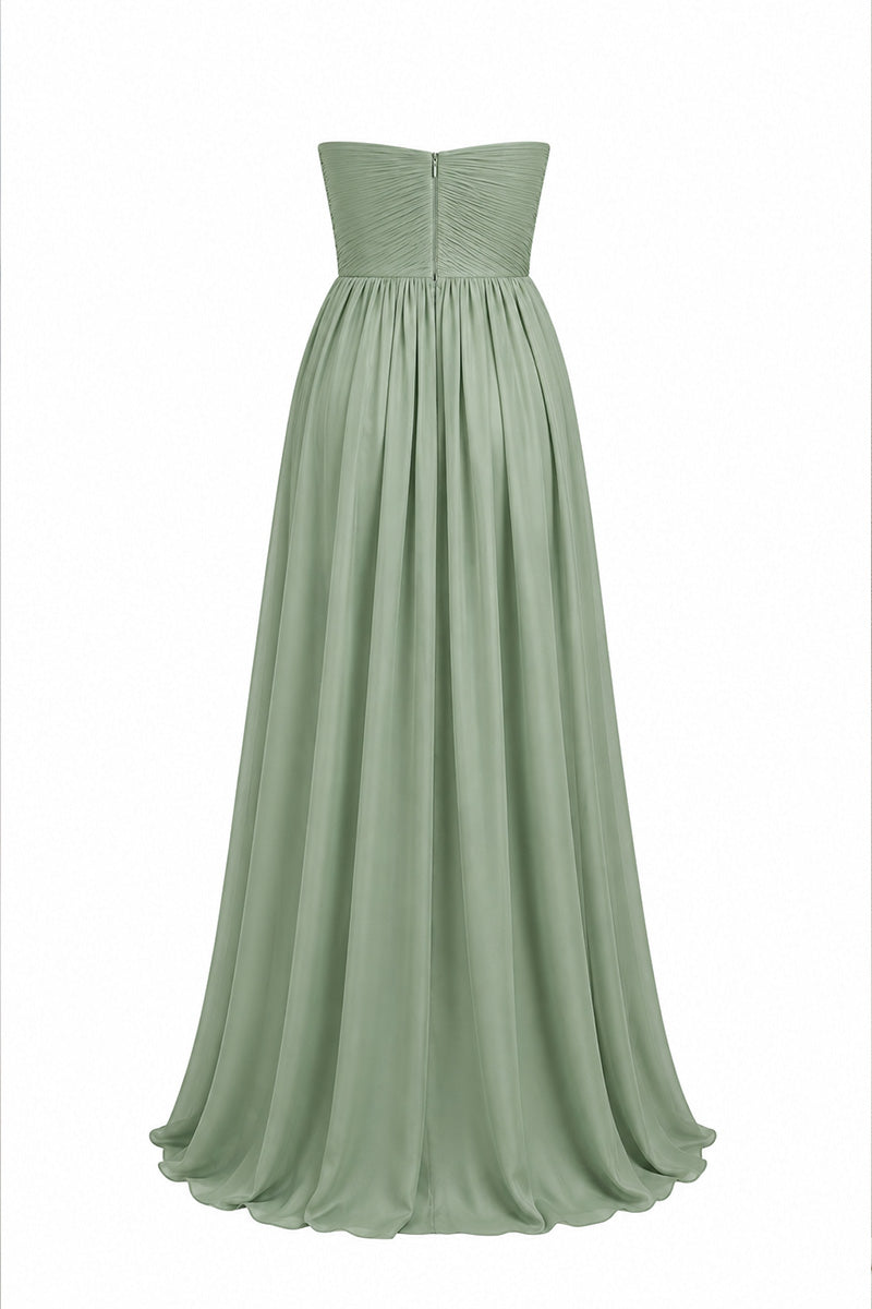 Elegant strapless gown with a detachable cape by Joanna Andraos, shown in a sleek and sophisticated design.