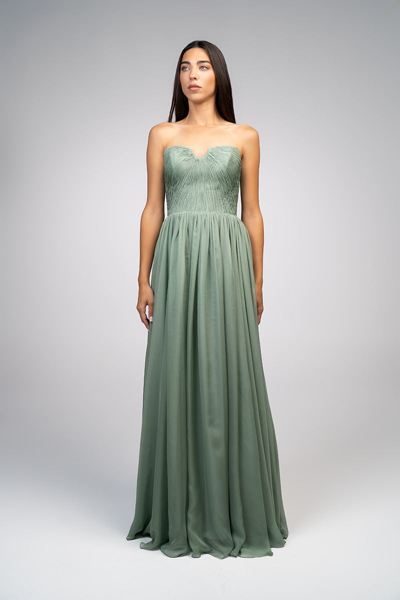 Joanna Andraos strapless gown with a flowing design and a detachable cape, elegant evening wear for formal occasions.