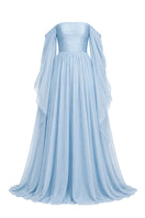 Baby blue strapless gown by Joanna Andraos, featuring elegant flowing fabric and a fitted bodice.