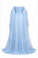 Baby blue strapless gown by Joanna Andraos featuring elegant draping and a flowing silhouette.