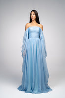 Baby blue strapless gown by Joanna Andraos, featuring elegant fabric and a flowing silhouette, perfect for formal occasions.