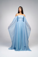 Baby blue strapless gown by Joanna Andraos, elegant formal dress with flowing fabric and fitted bodice, perfect for special occasions.