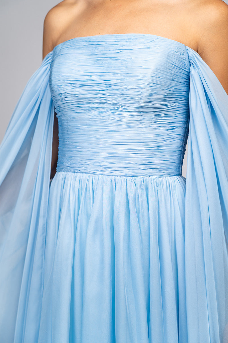 Baby blue strapless gown by Joanna Andraos featuring elegant fabric and a flowing silhouette, perfect for formal occasions.