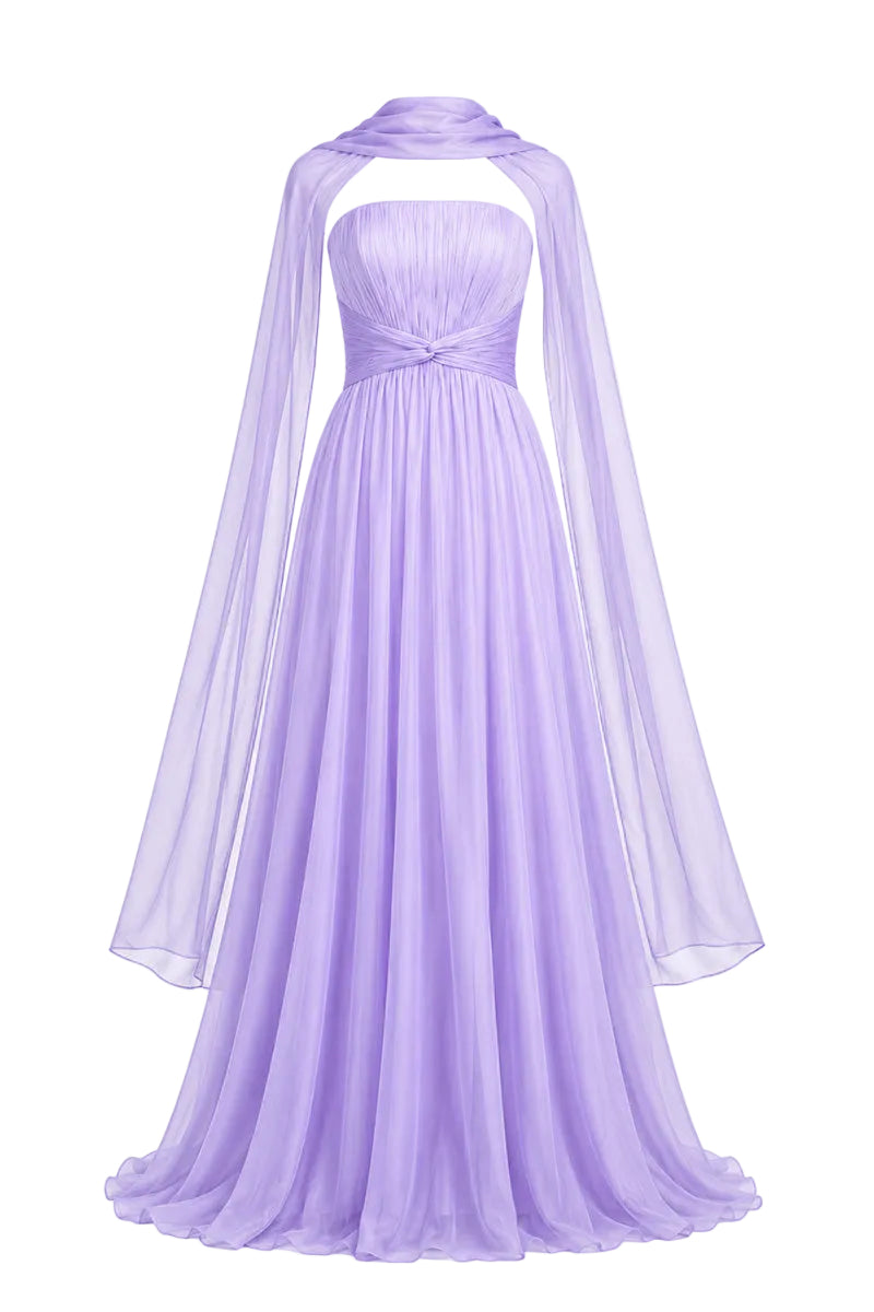 Elegant lavender gown by Joanna Andraos, featuring flowing fabric and intricate details, perfect for formal occasions.