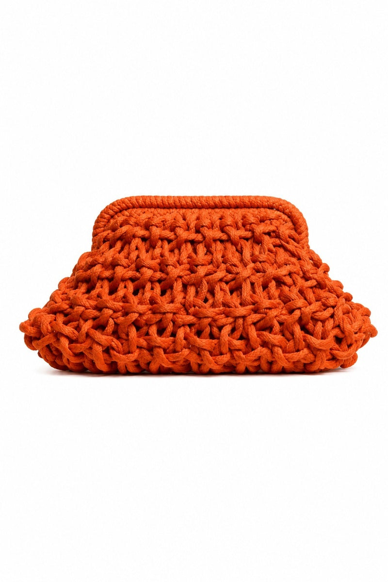 Small rust-colored rope clutch bag by Folklore The Label, featuring a compact design with a textured rope exterior.